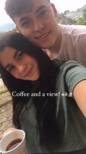  Emoji of coffee and mountains. Joshua pictured with a friend. 
