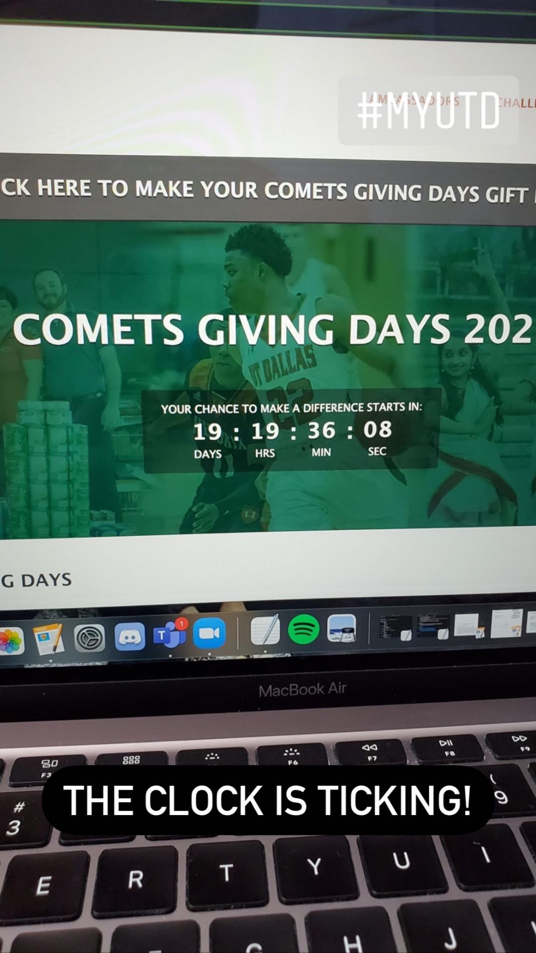 Laptop screen shows countdown to Comets Giving Day website.