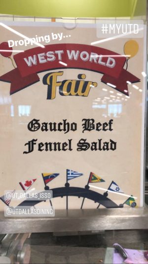 A printed sign that reads, West World Fair. Guacho Beef. Fennel Salad.